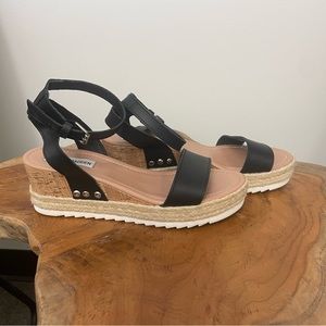 Black, cork & espadrille sandals.